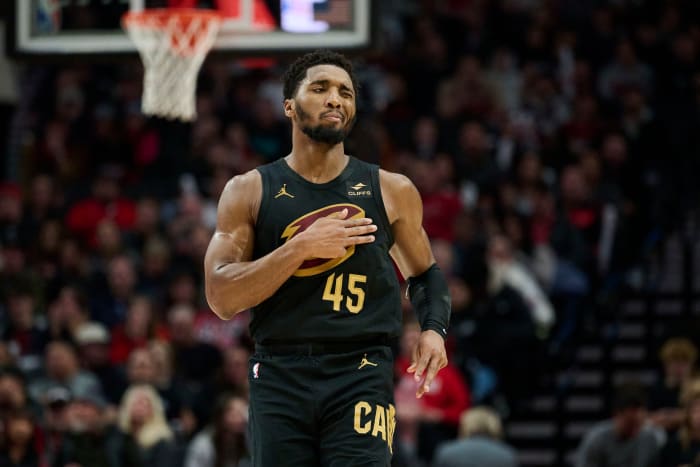 Nov 15, 2023; Portland, Oregon, USA; Cleveland Cavaliers guard Donovan Mitchell (45) reacts after scoring a three point basket during the second half against the Portland Trail Blazers at Moda Center. Mandatory Credit: Troy Wayrynen-USA TODAY Sports